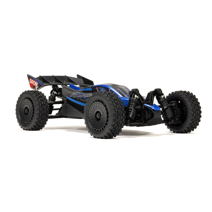 ARRMA Typhon Grom BLX red/black action shot on dry grass