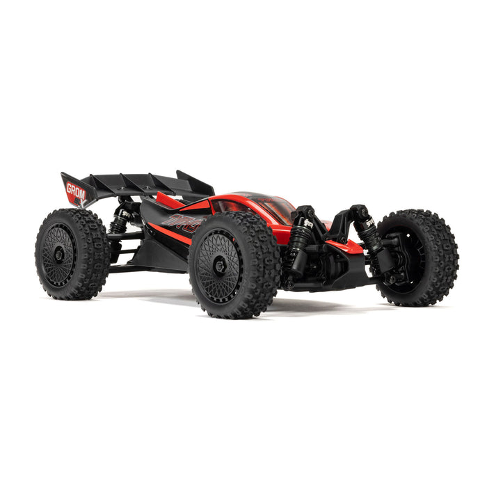 ARRMA Typhon Grom BLX blue ripping through dirt